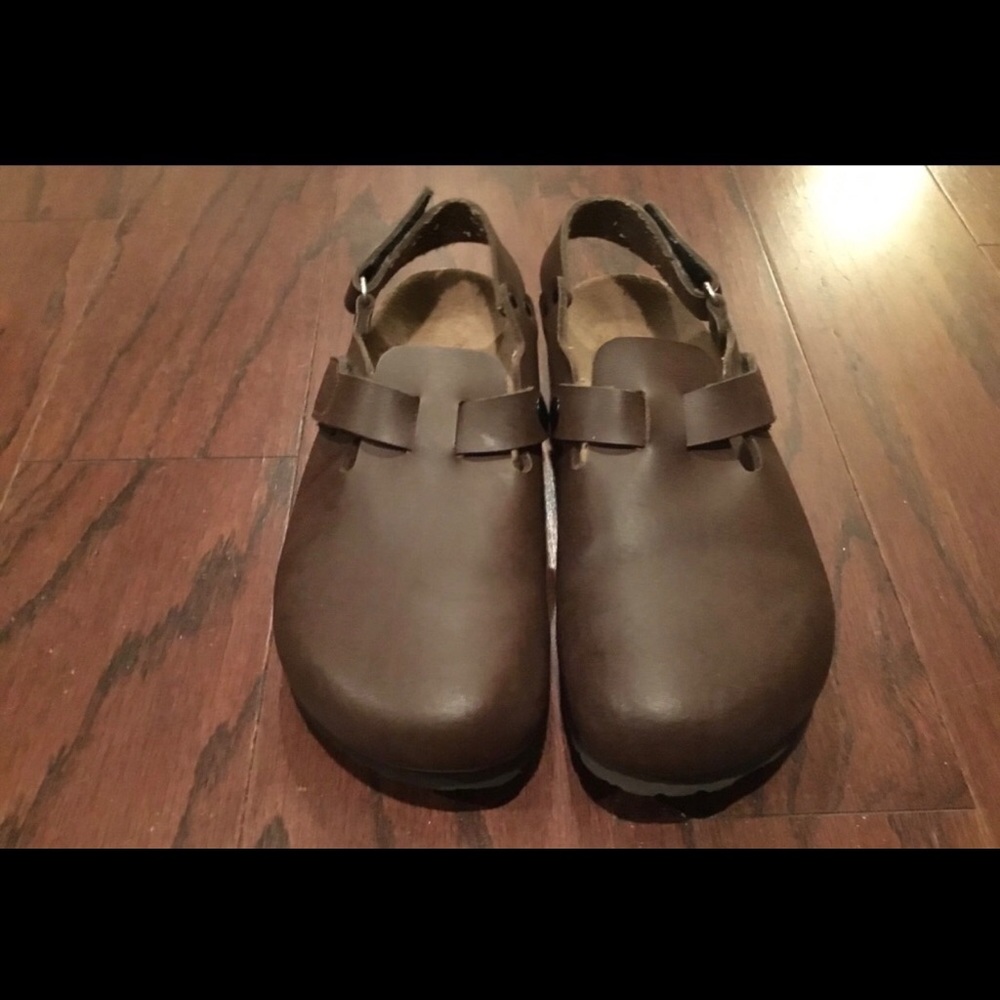 Birkenstock’s Birki’s  brown leather clogs.